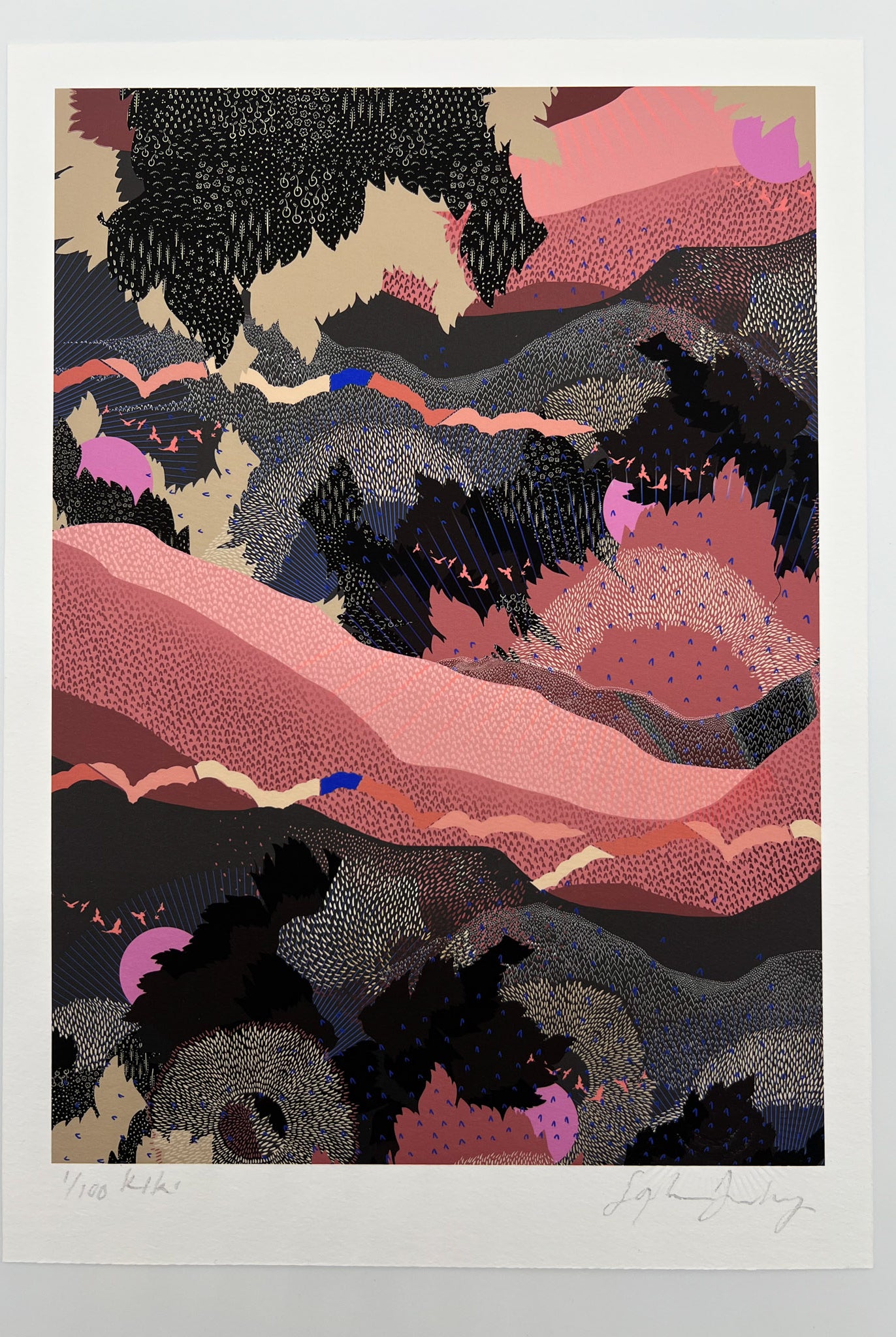 A giclee print in black and pink with a landscape design and bright pink suns