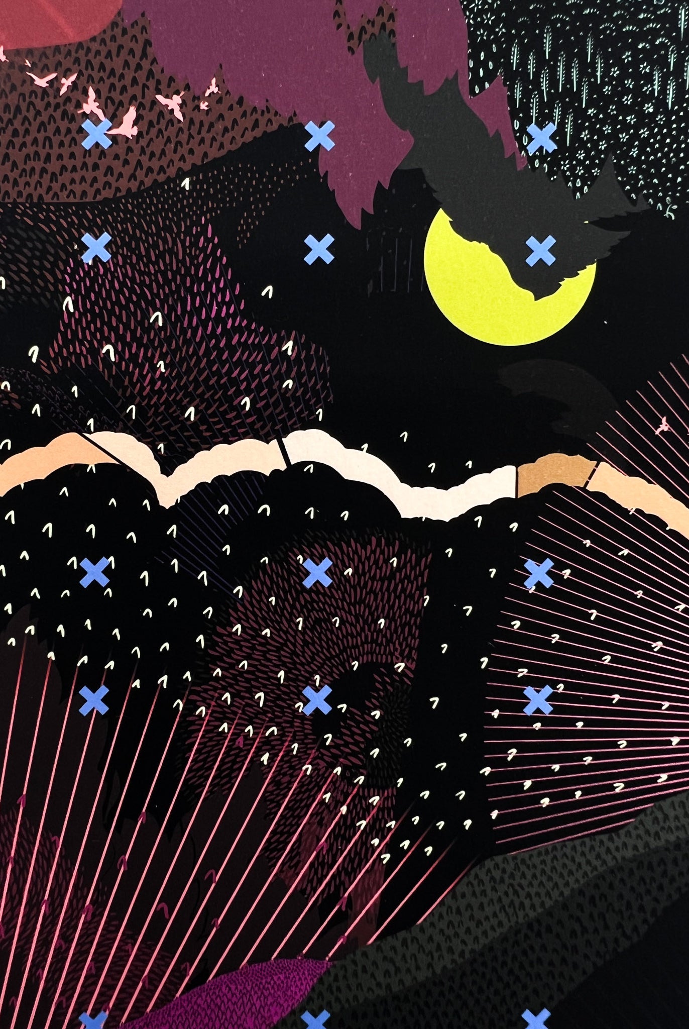 A close up of a giclee print with landscape design in greens and pinks with lime green moon details