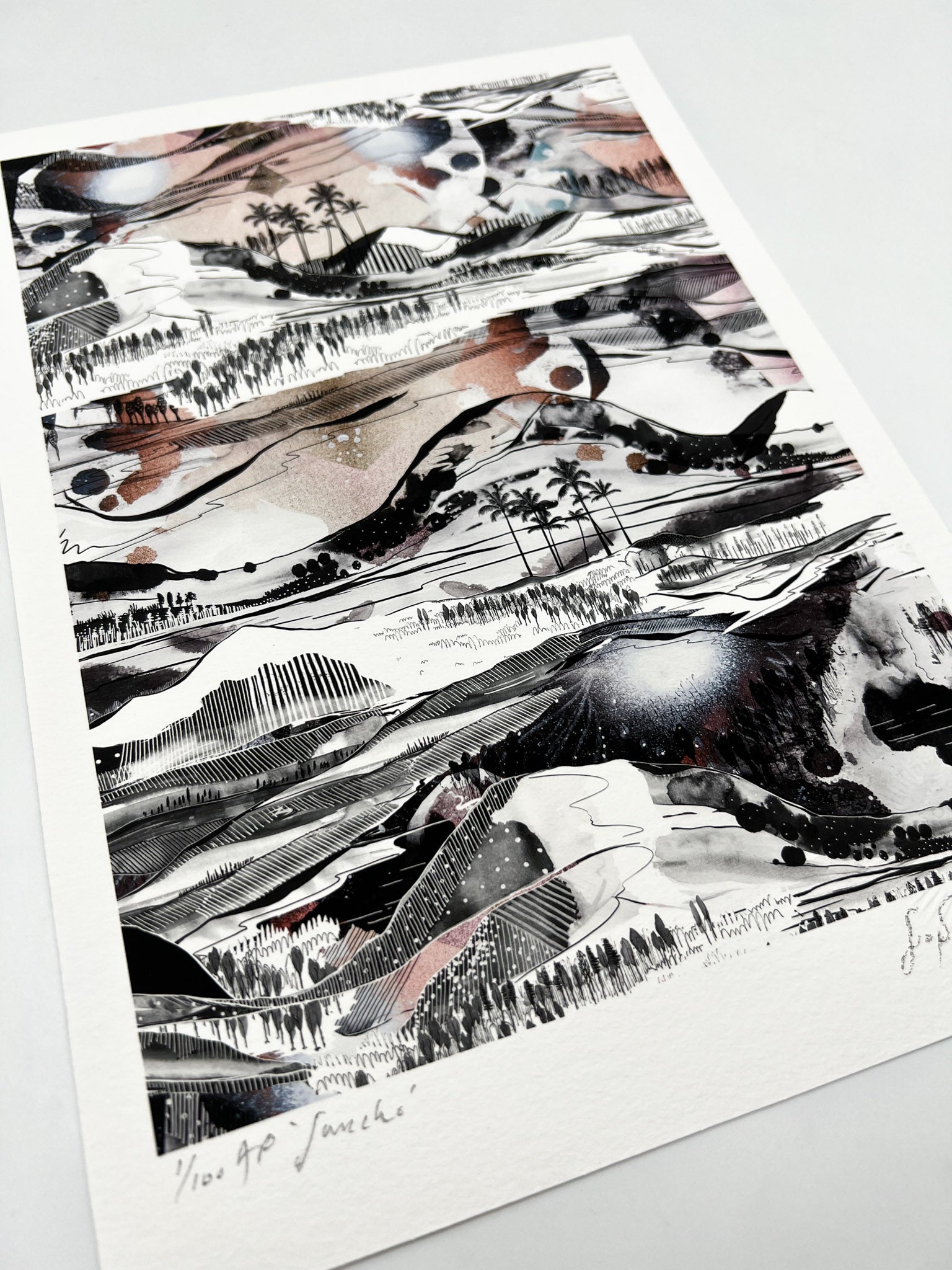 A giclee print of a landscape design in black, white and soft peachy tones