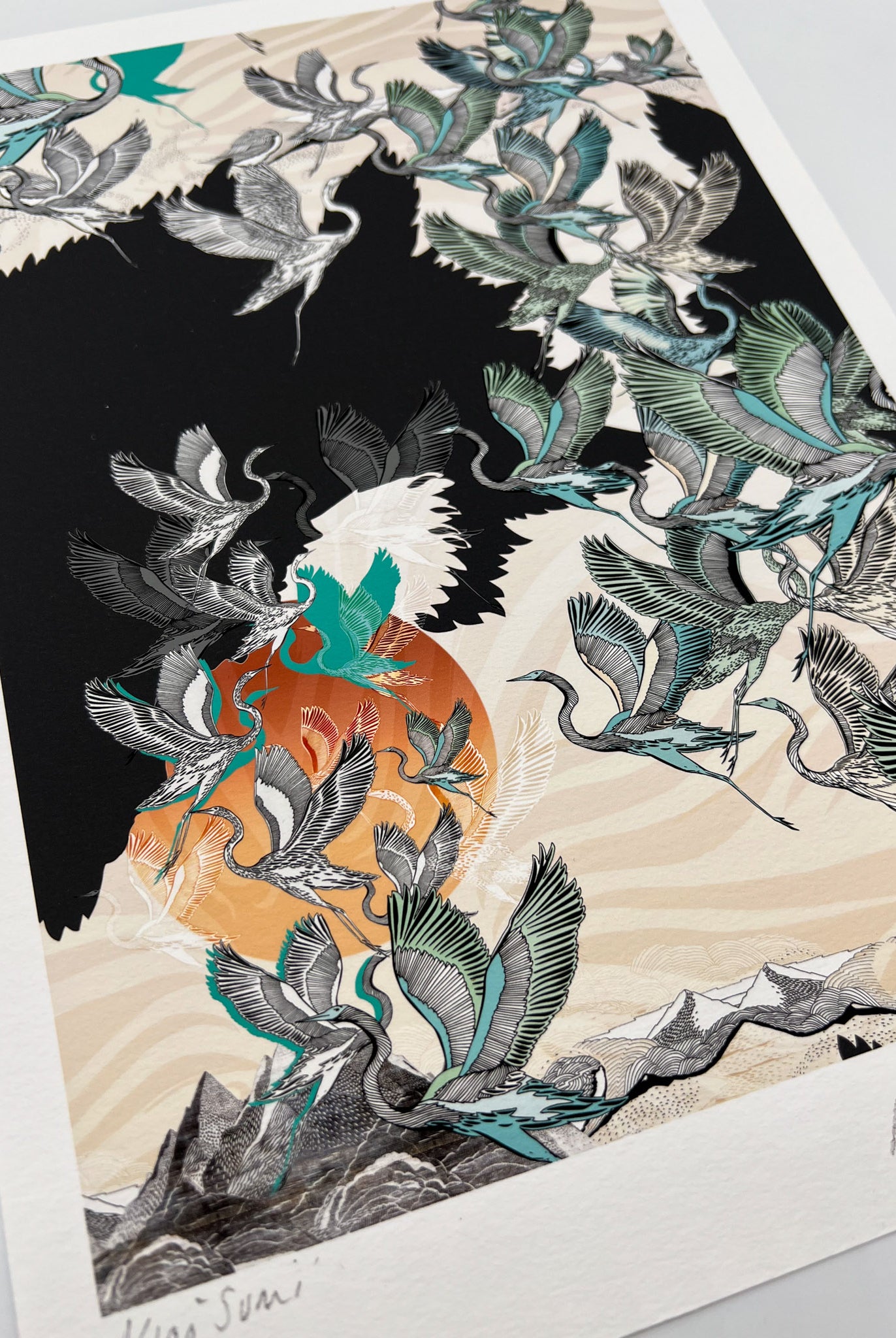 A Giclee print of a sunrise and stalk design in black, orange and blue