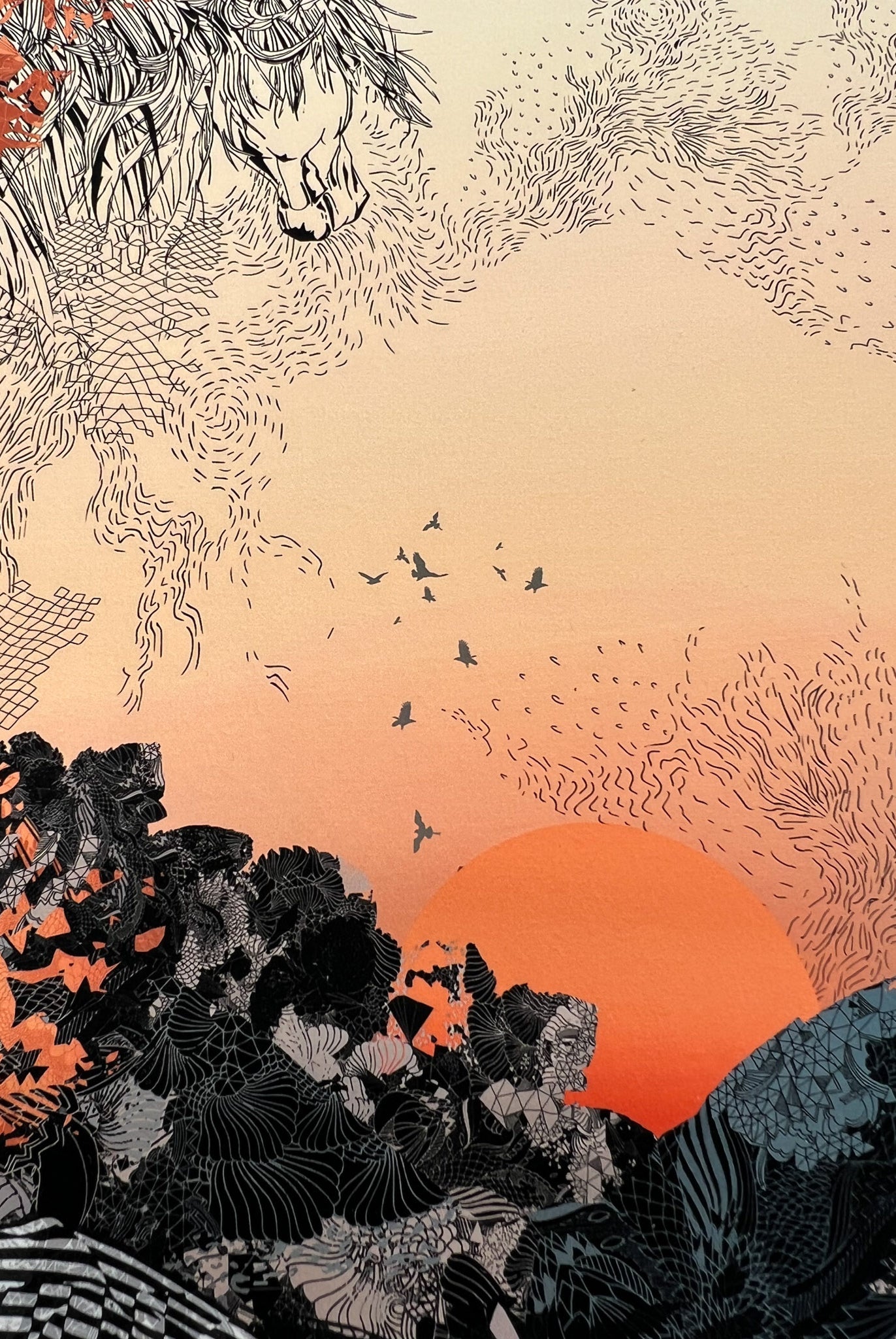 A close up of a giclee print with Sunrise design in oranges and blacks