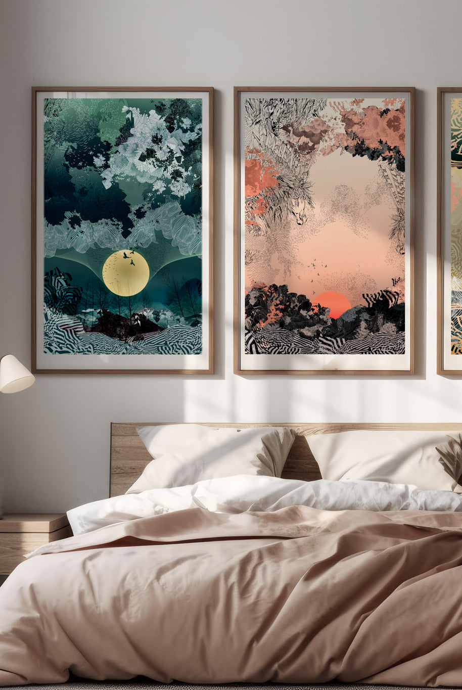 A mock up of a giclee print with Sunrise design in oranges and blacks in a wood frame, above a bed