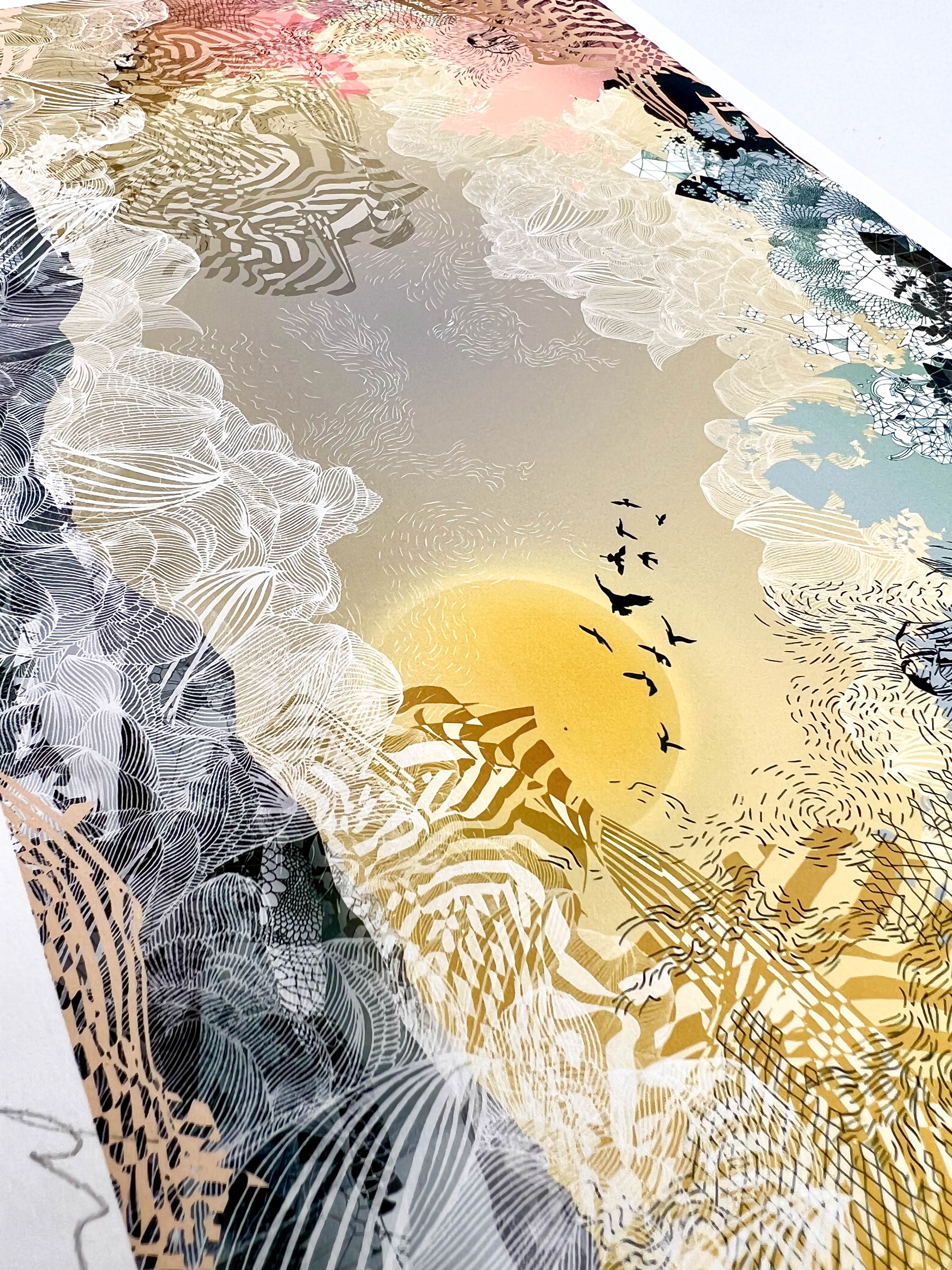A Close up of a giclee print with sunrise and mountain landscape print in muted yellows and greens
