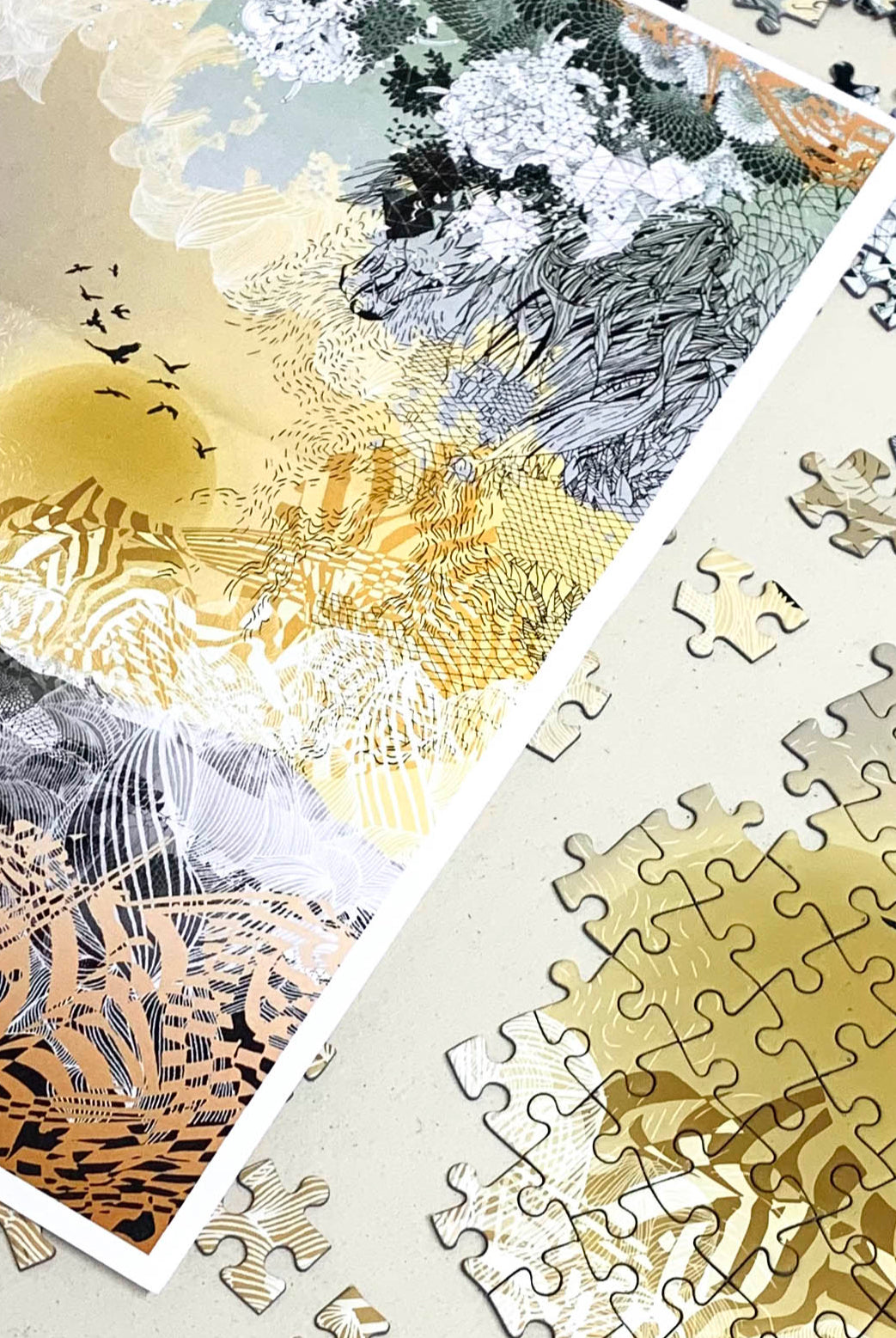 A printed jigsaw box of a yellow and orange landscape