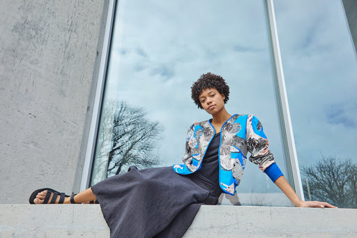 Girl reclining in lightweight summer cotton jacket