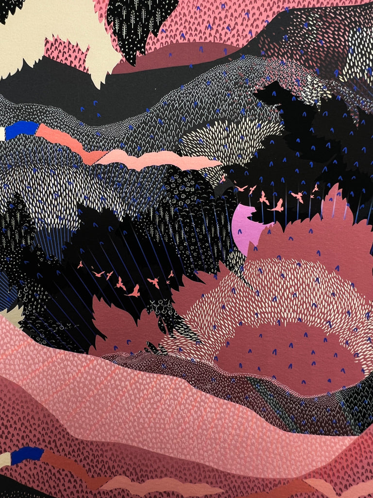 A close up of a giclee print in black and pink with a landscape design and bright pink suns