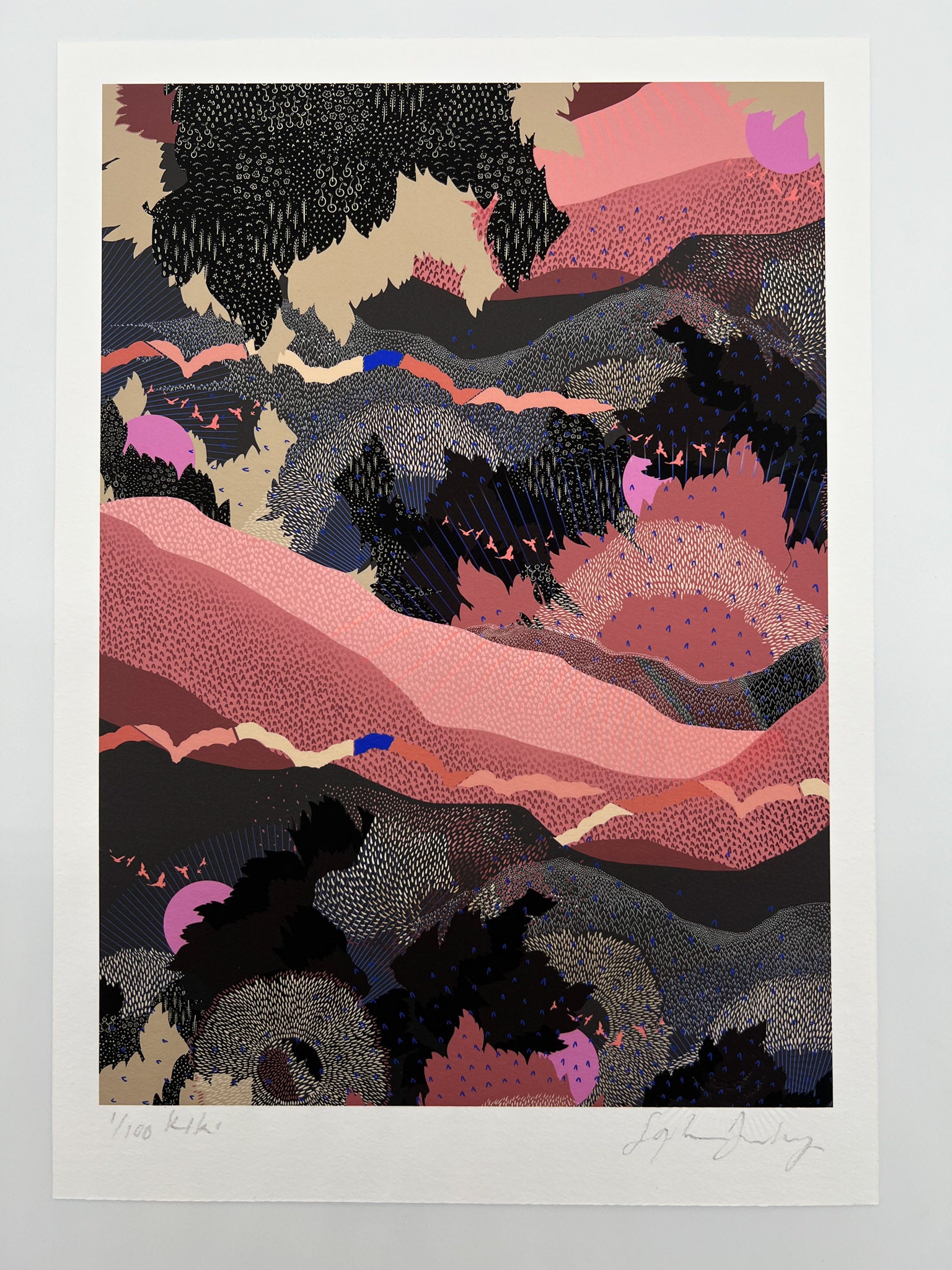 A giclee print in black and pink with a landscape design and bright pink suns