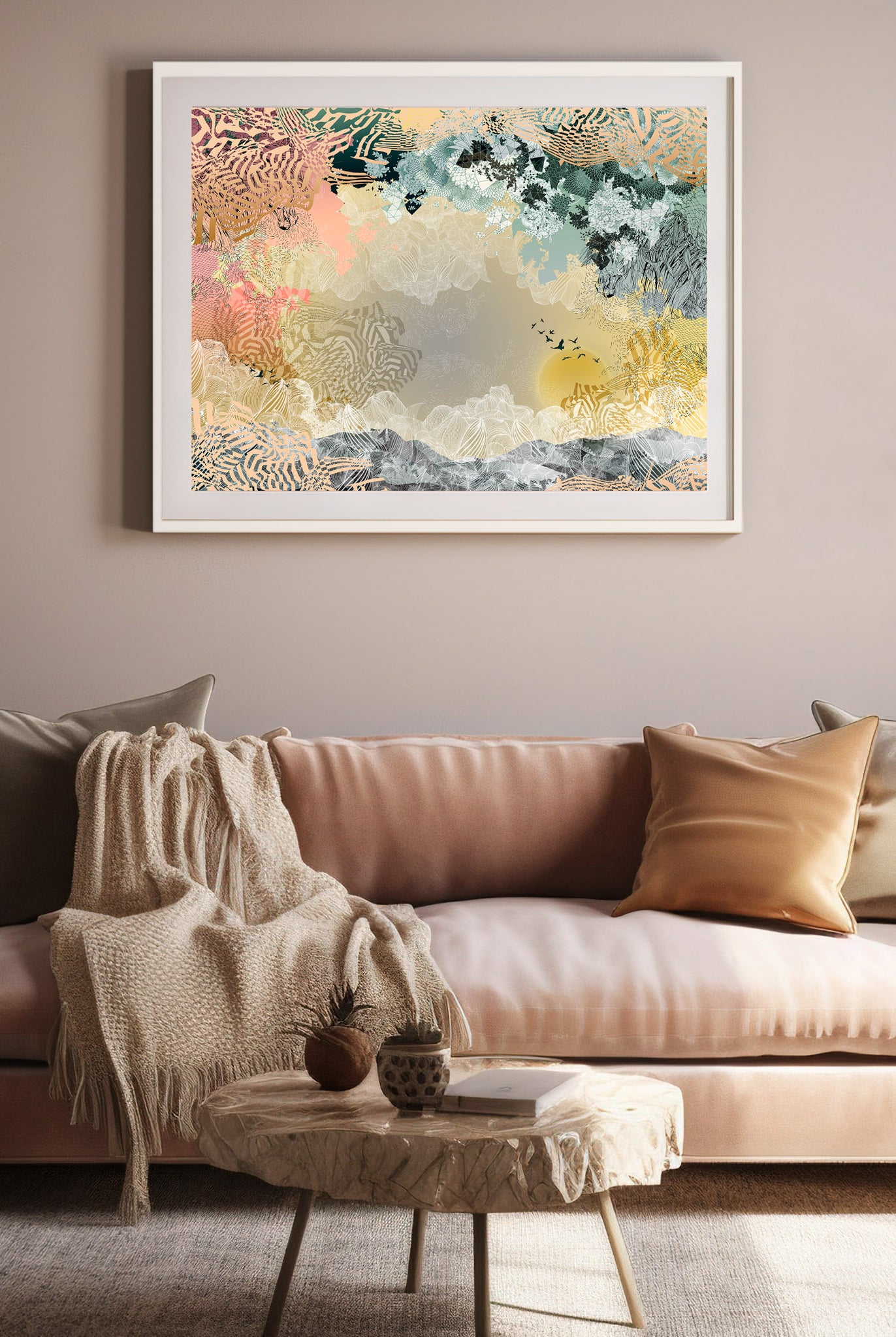 A mock up of a Giclee print in a white frame in front of a pink sofa