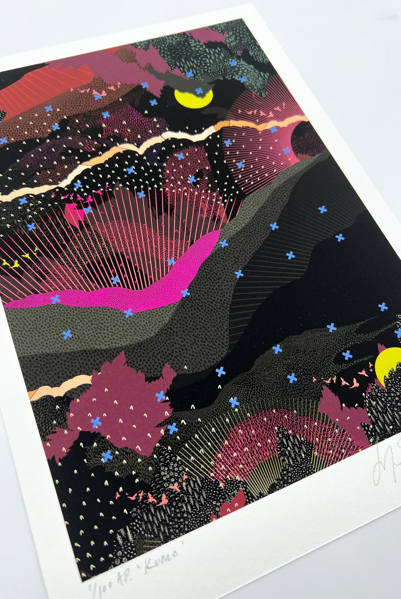 A giclee print with landscape design in greens and pinks with lime green moon details