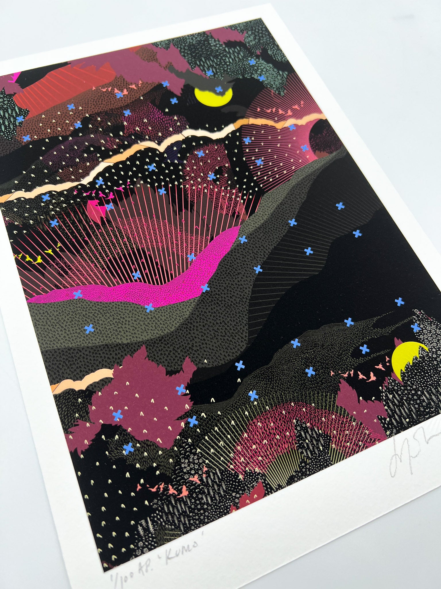 A giclee print with landscape design in greens and pinks with lime green moon details