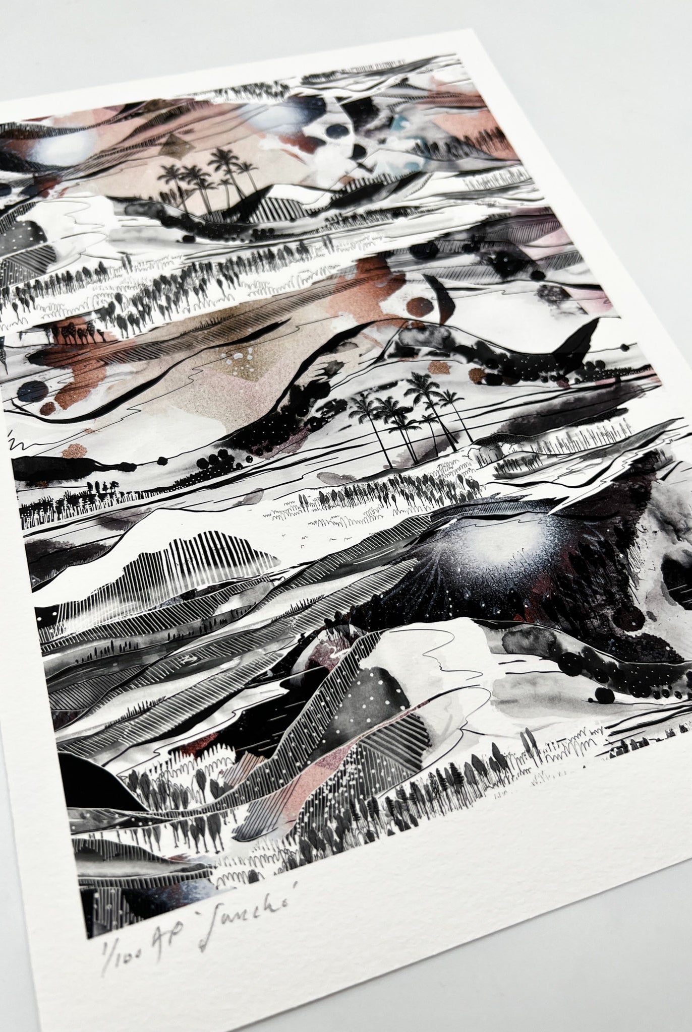 A giclee print of a landscape design in black, white and soft peachy tones