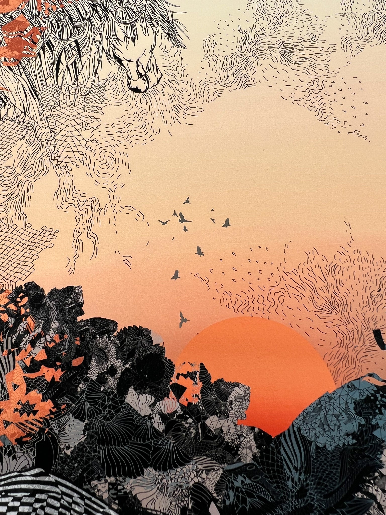 A close up of a giclee print with Sunrise design in oranges and blacks