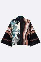 The front of a silk cropped kimono jacket
