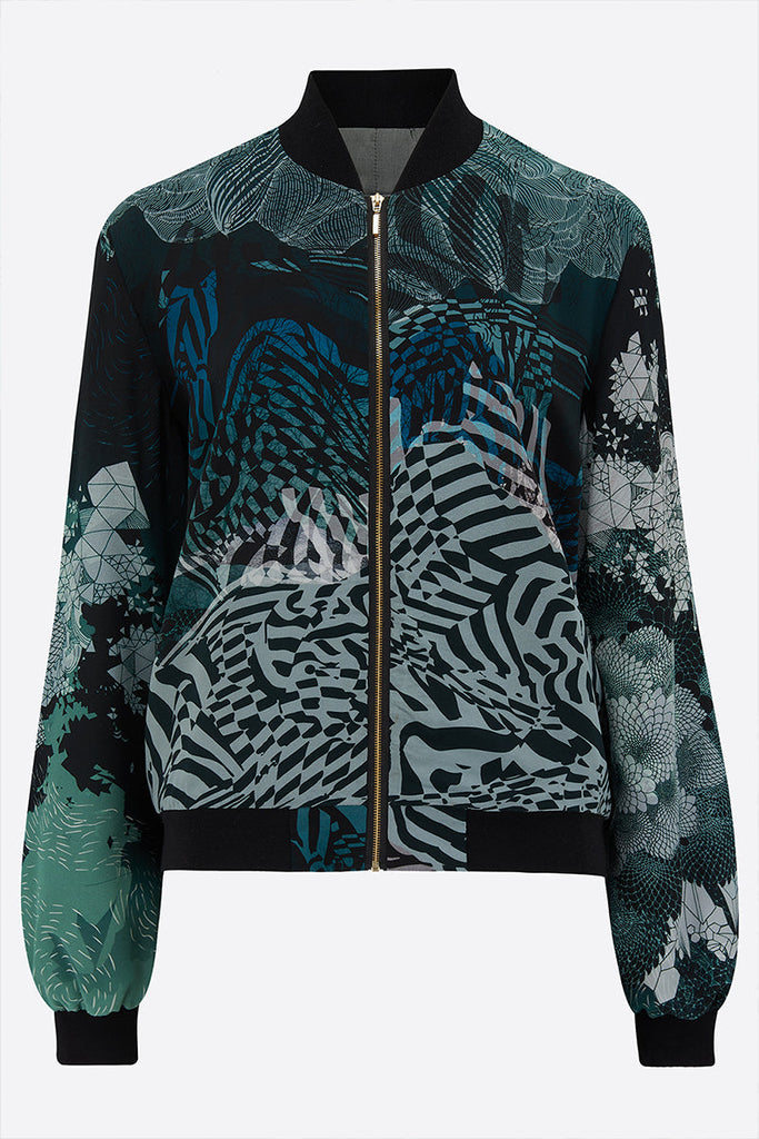 Front of a Silk Bomber Jacket with a intricate geometric patterns in shades of blues 
