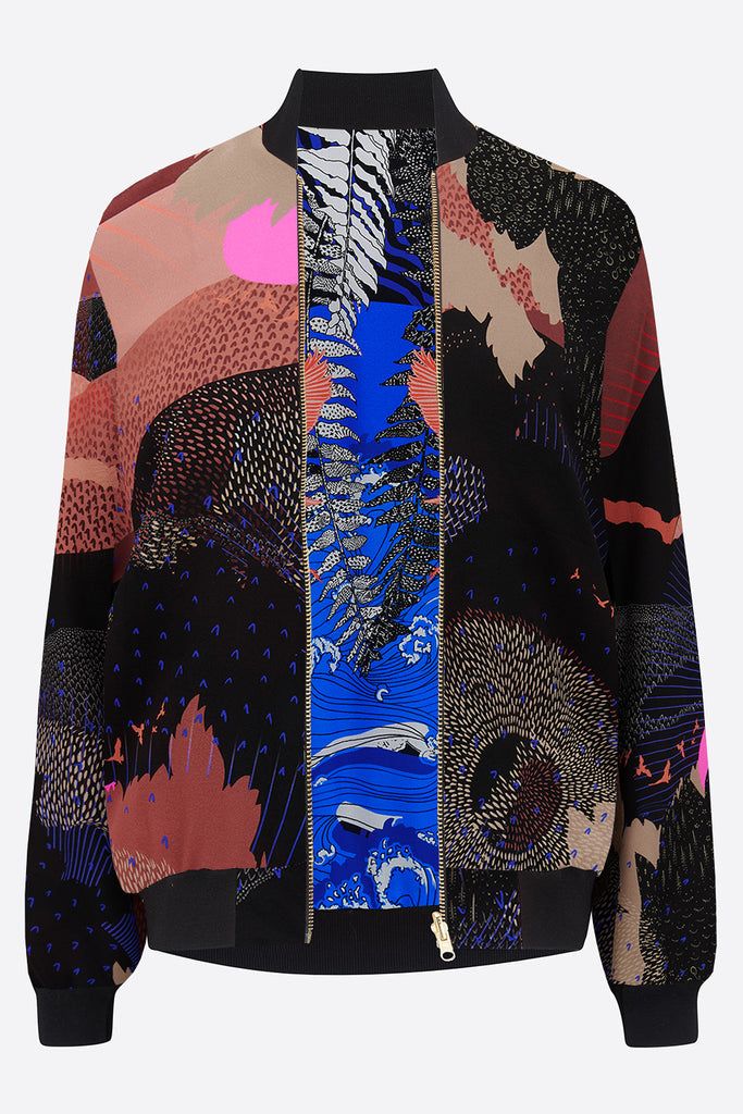 A silk printed bomber jacket with pink, blue and black 