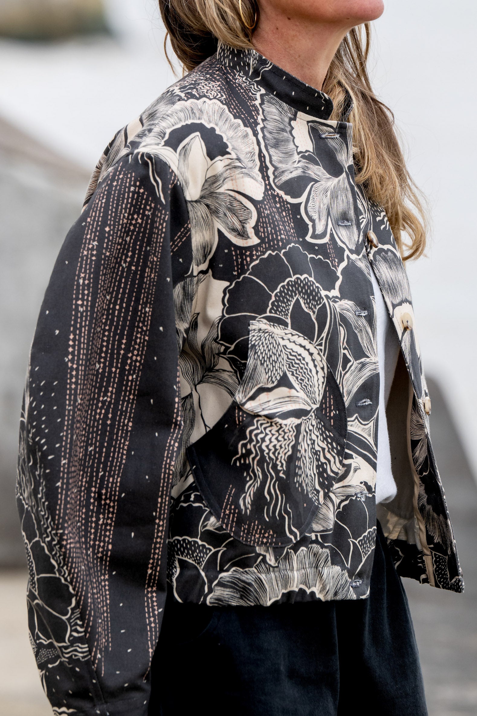 Organic cotton bomber jacket women tulip sleeve detail black floral print sustainable fashion UK
