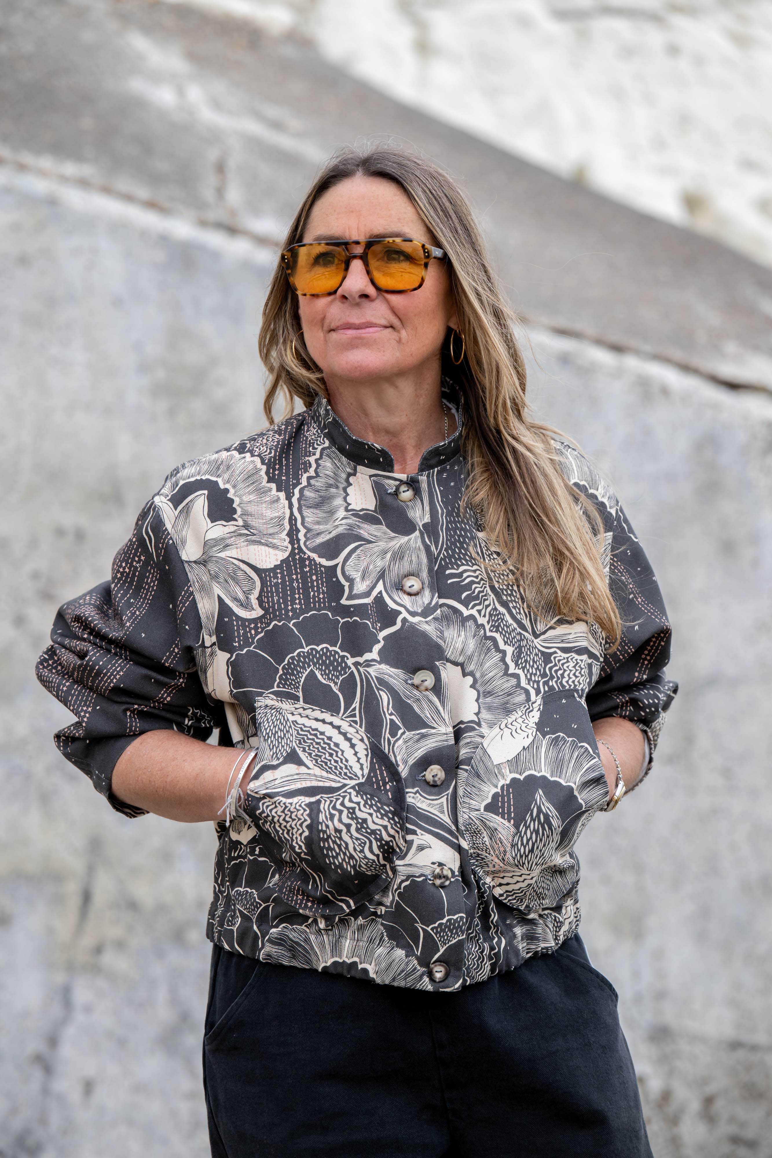 Womens designer cotton bomber jacket pleated pocket horn buttons black floral print detail