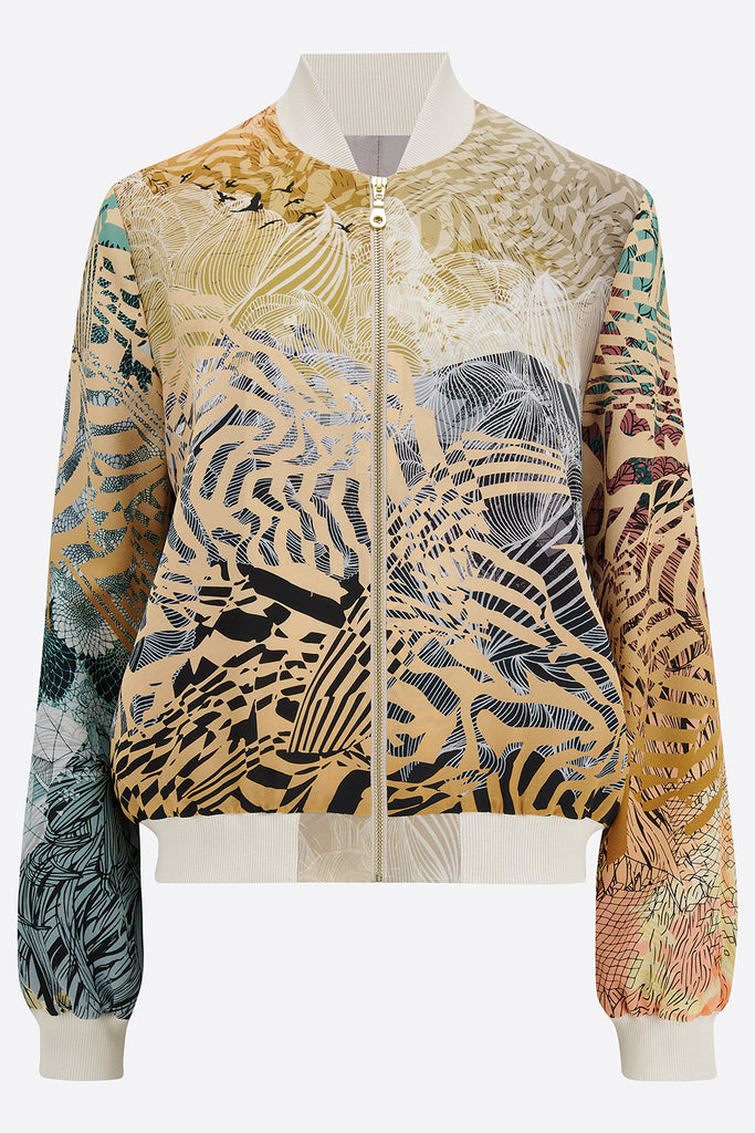 Front of silk bomber jacket in muted yellows and greens with a mountain landscape and sunrise design
