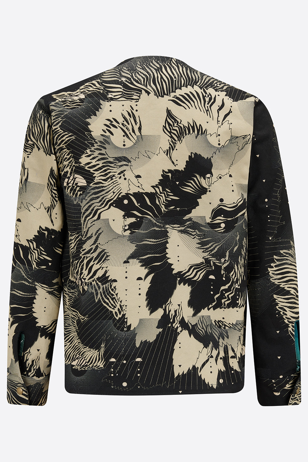 The back of a cotton mens utility jacket with a navy and cream abstract floral print