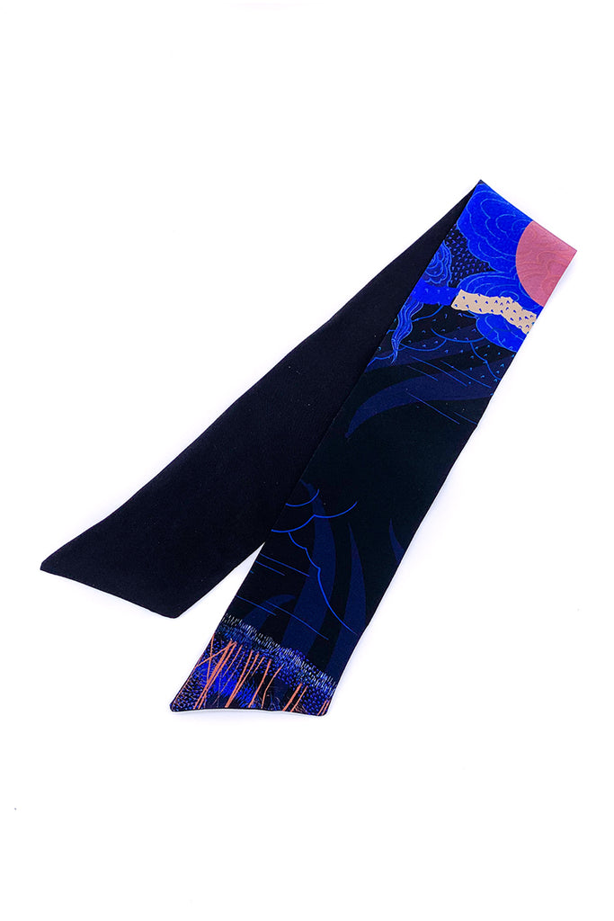 A silk printed headscarf in black and blue