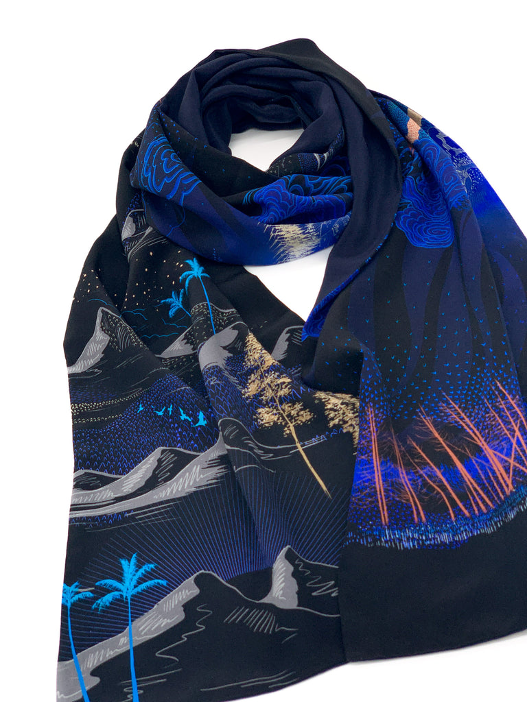A printed silk scarf in black and blue