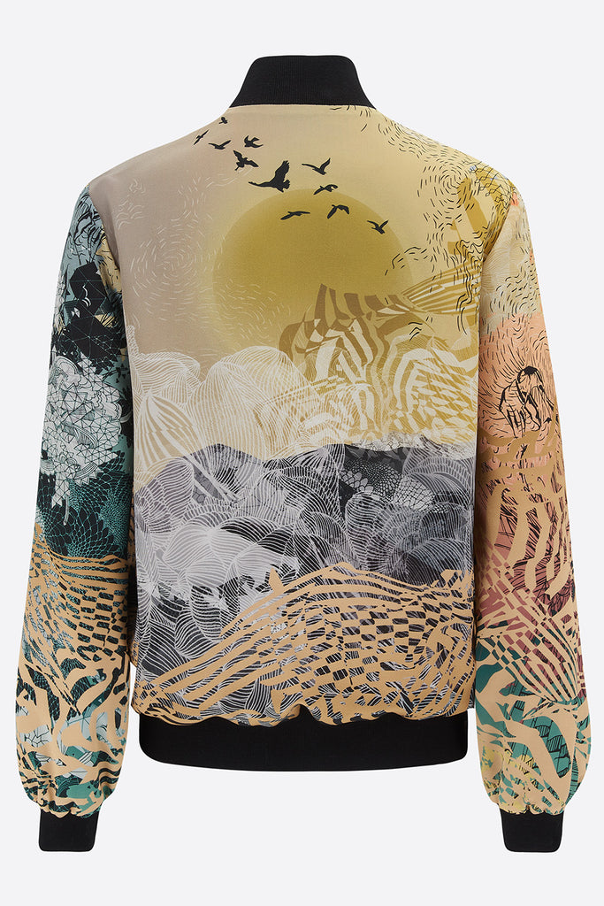 Back of a silk bomber jacket with sunset design in yellows and grey