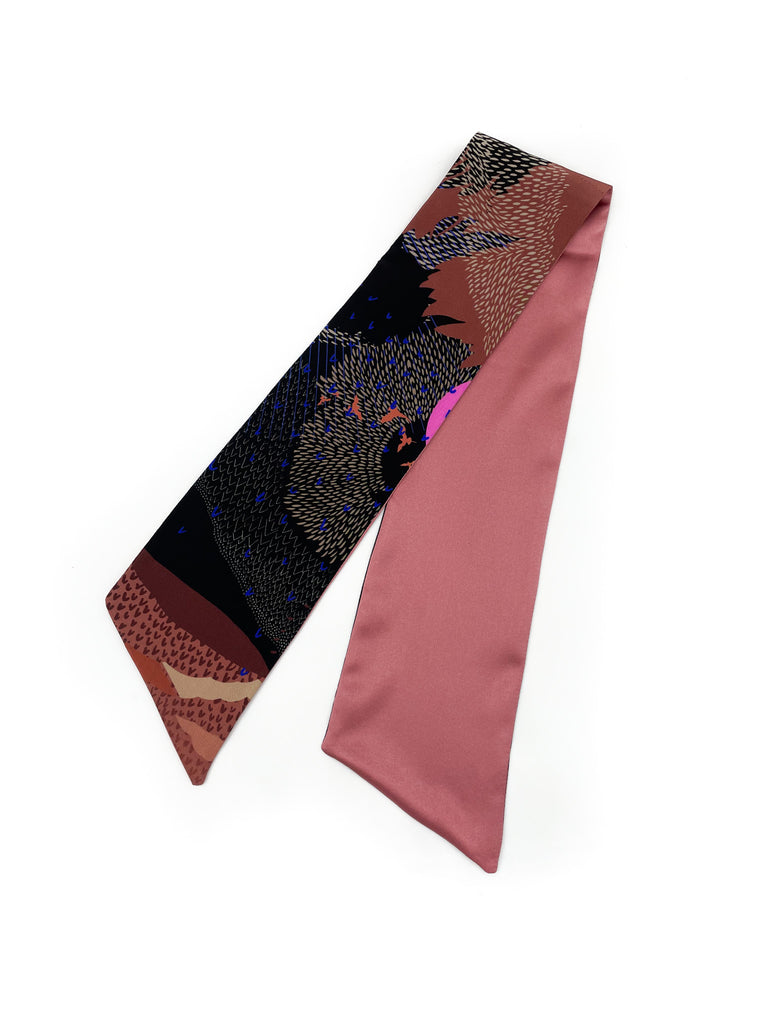 A silk printed headscarf in black and pink