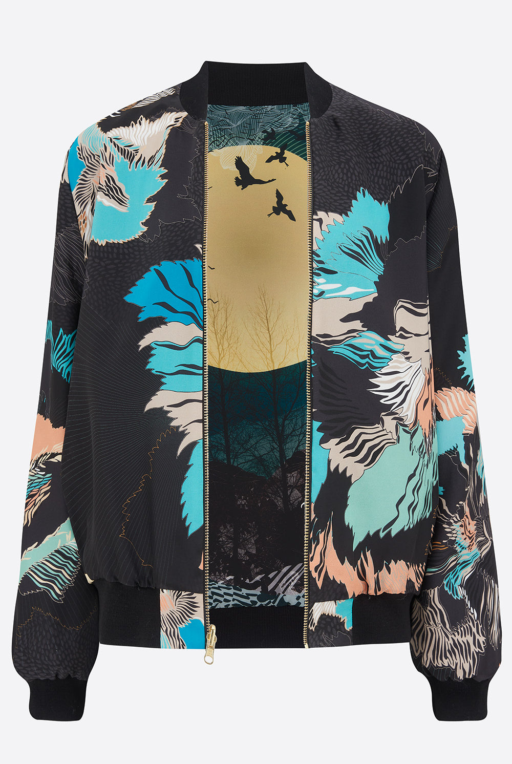 An open reversible silk bomber jacket with florals on one side and an blue moon print on the other
