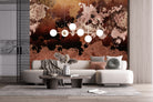 Mural wallpaper in situ in deep reds and oranges with geometric floral design