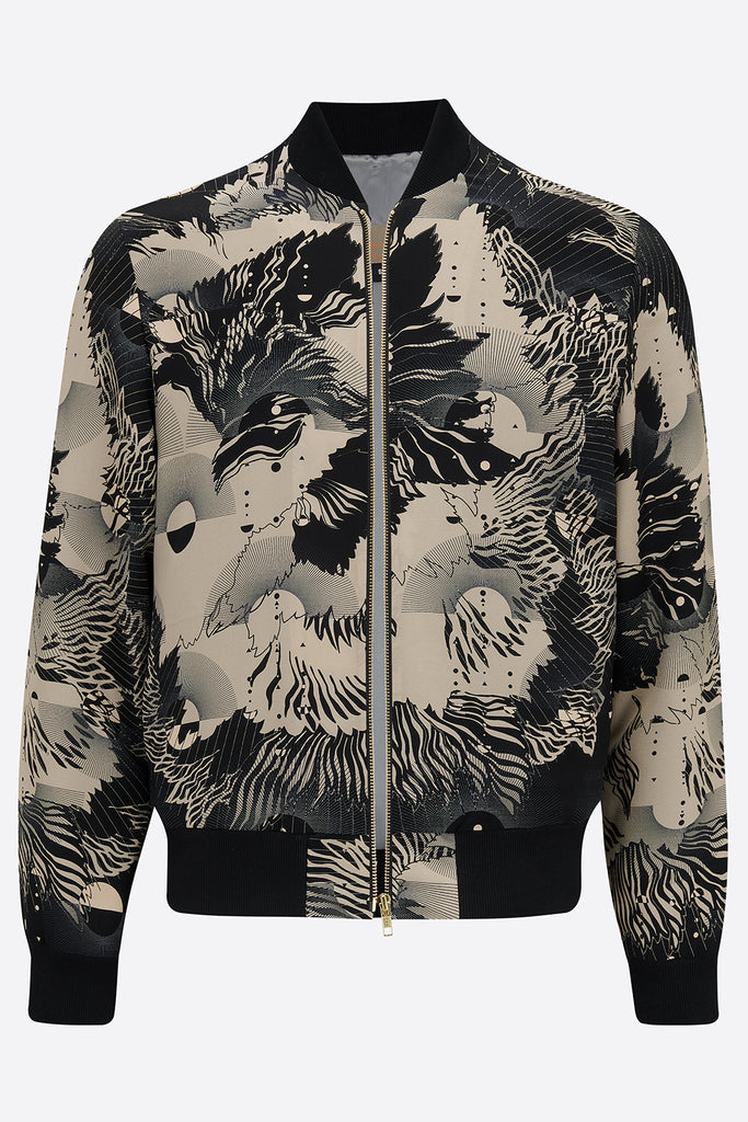 The front of an unzipped mens bomber jacker in a deep navy and cream print abstract floral print