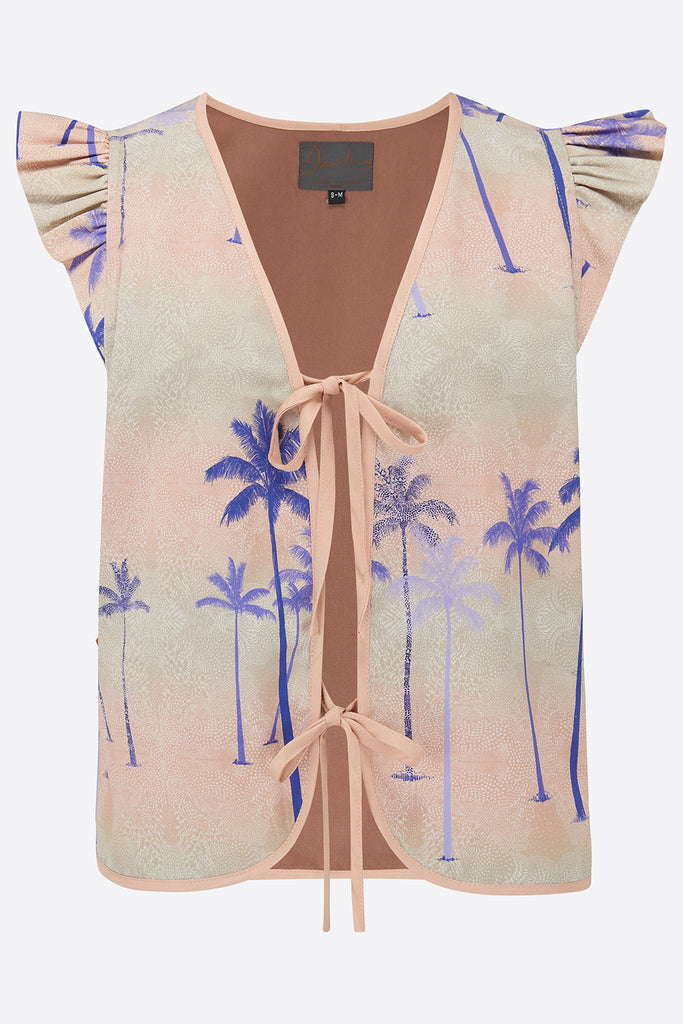 A pink tencel lined waistcoat with a palm tree print