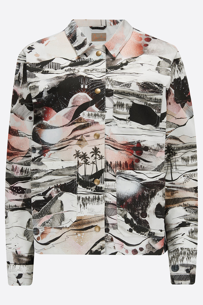 The front of a cotton utility jacket with a hand drawn landscape in black, white and red 