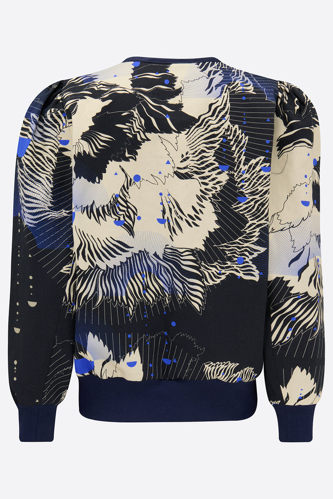 The back of a cotton jacket with an abstract floral print in navy and cream